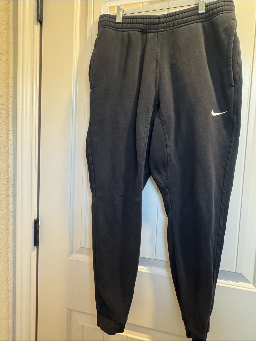 Nike Black Jogger Sweatpants with White Swoosh